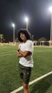 Wafae Nacha, Moroccan football coach in UAE, empowering women in sports. 