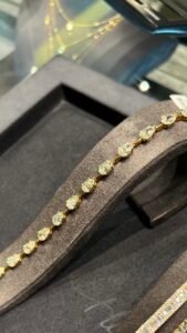 very-unique-pear-shape-gold-band-bracelet-from-harmony-jewelers.