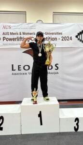 Naila Al Mehairbi, Emirati powerlifter, competing and inspiring women in strength sports. 