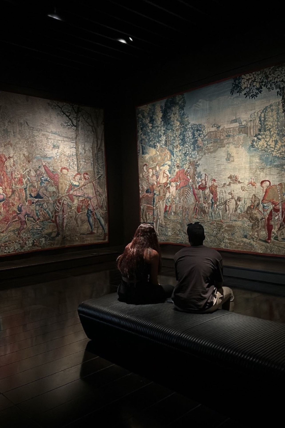 Visitors viewing art at Louvre Abu Dhabi